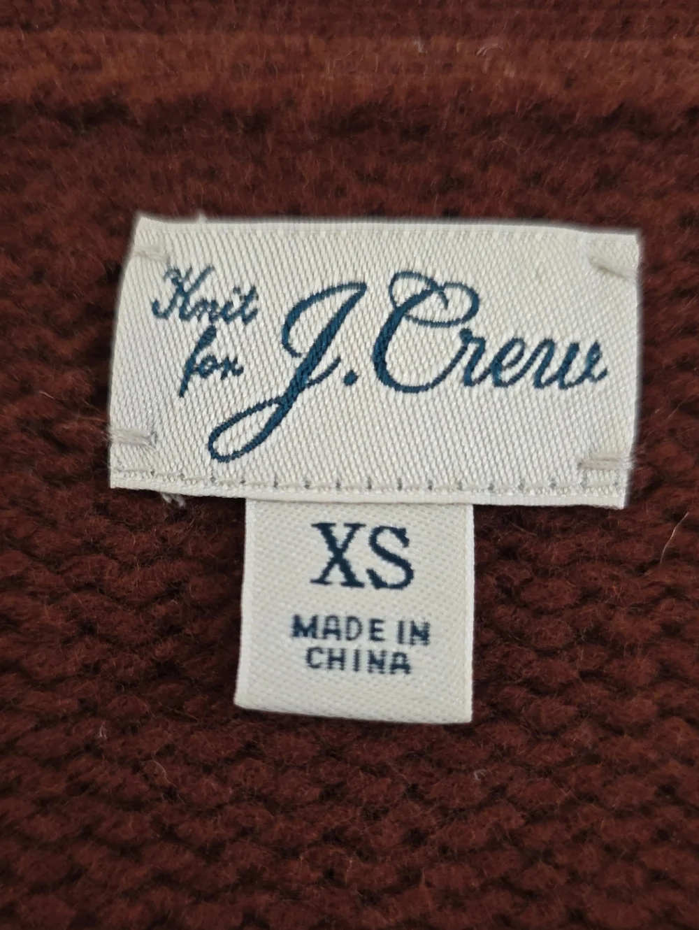 J. Crew Men's Wool V-neck cardigan sweater with Harris Tweed.